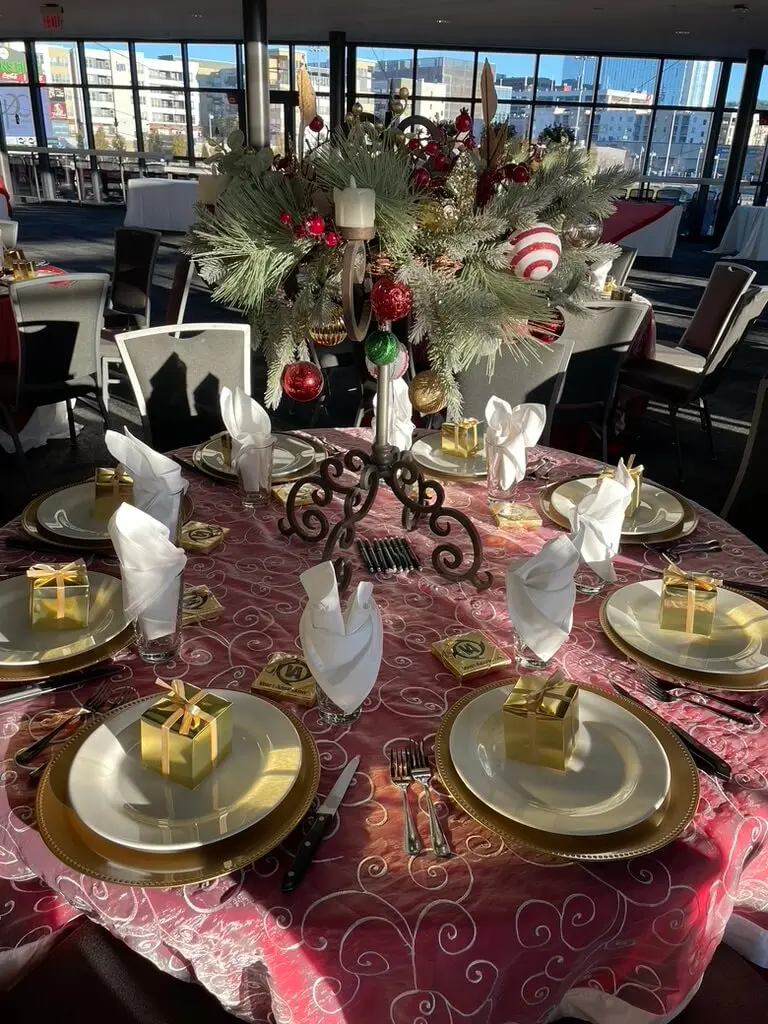 Beautifully set corporate holiday party table